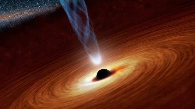 Hungry black hole among the most massive in the Universe