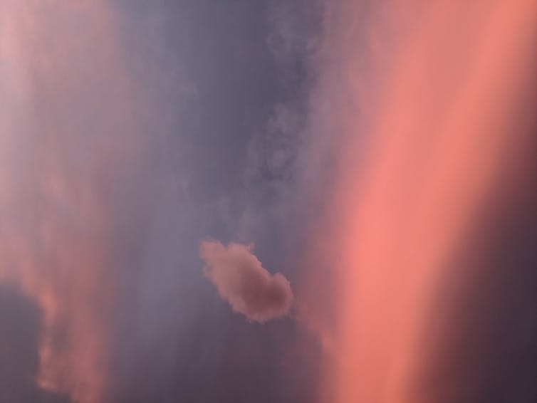 Clouds in the sky that are shades of pink