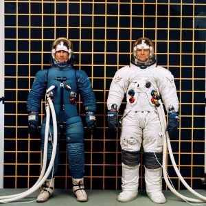 Two versions of the Apollo A-6L spacesuit for use inside and outside the shuttle.